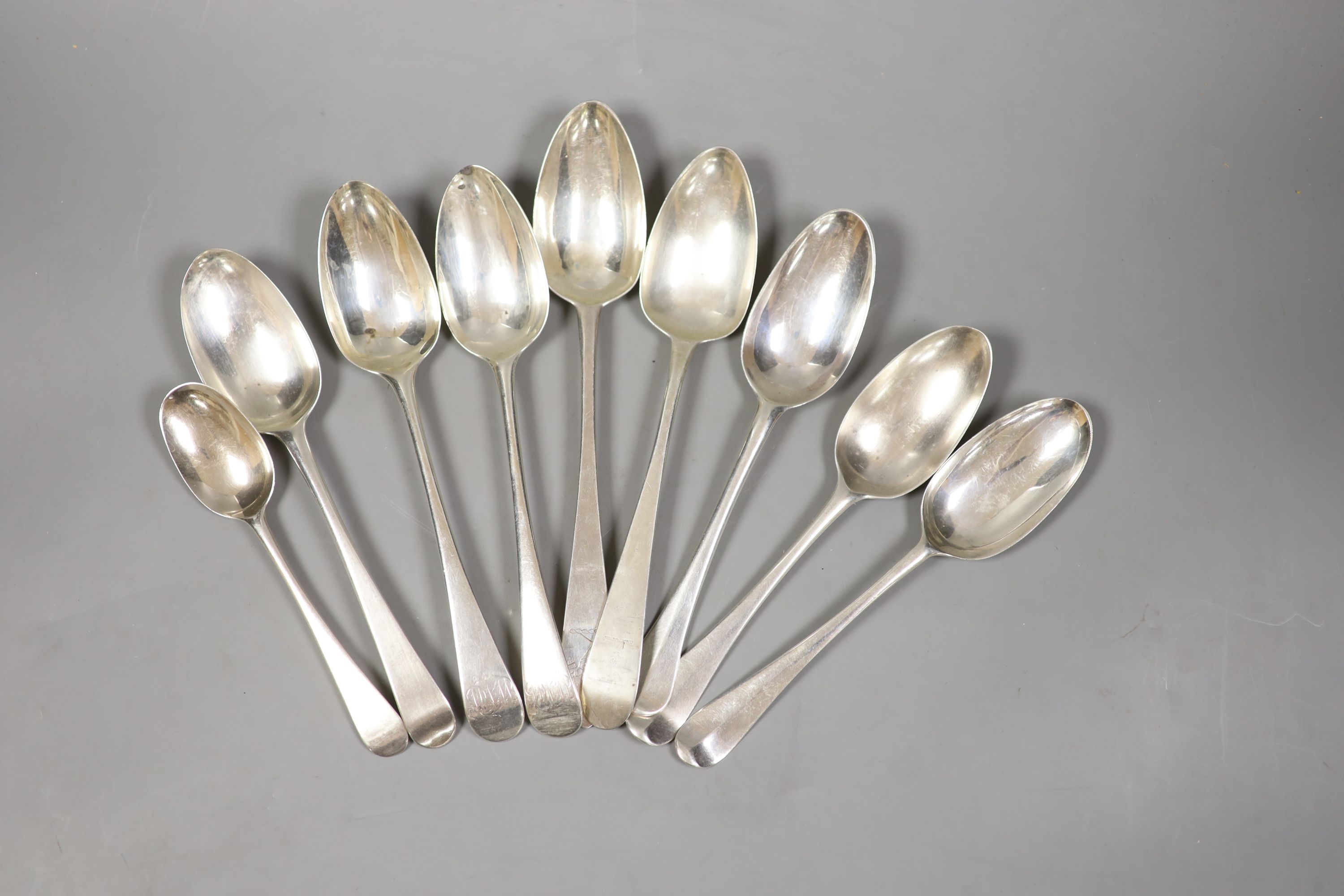 Nine assorted 18th and 19th century silver table and desert spoons, various dates and makers
